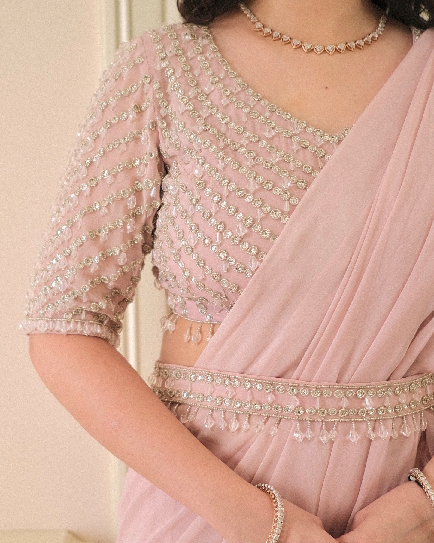 Peach Ruffle Saree with Hand-Embroidered Blouse & Belt